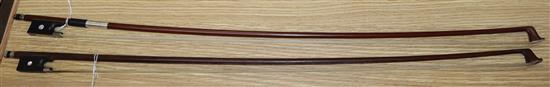 Two round stick violin bows with mother of pearl inlay, one with white metal mount